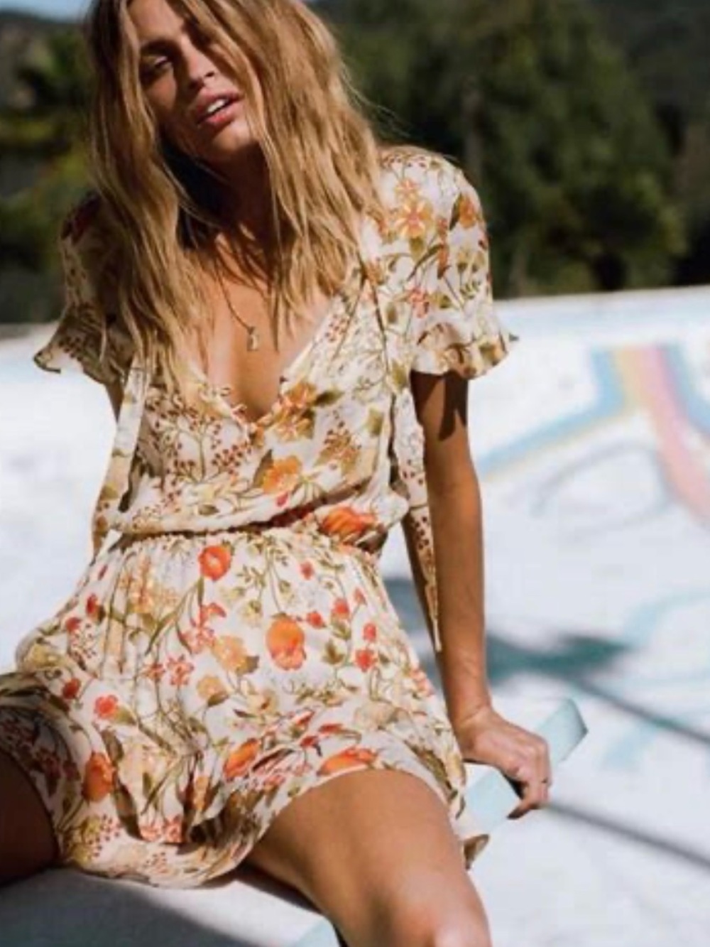 Spell “Sayulita” play dress. Floral Cream Mini Dress with Orange and Green Print
